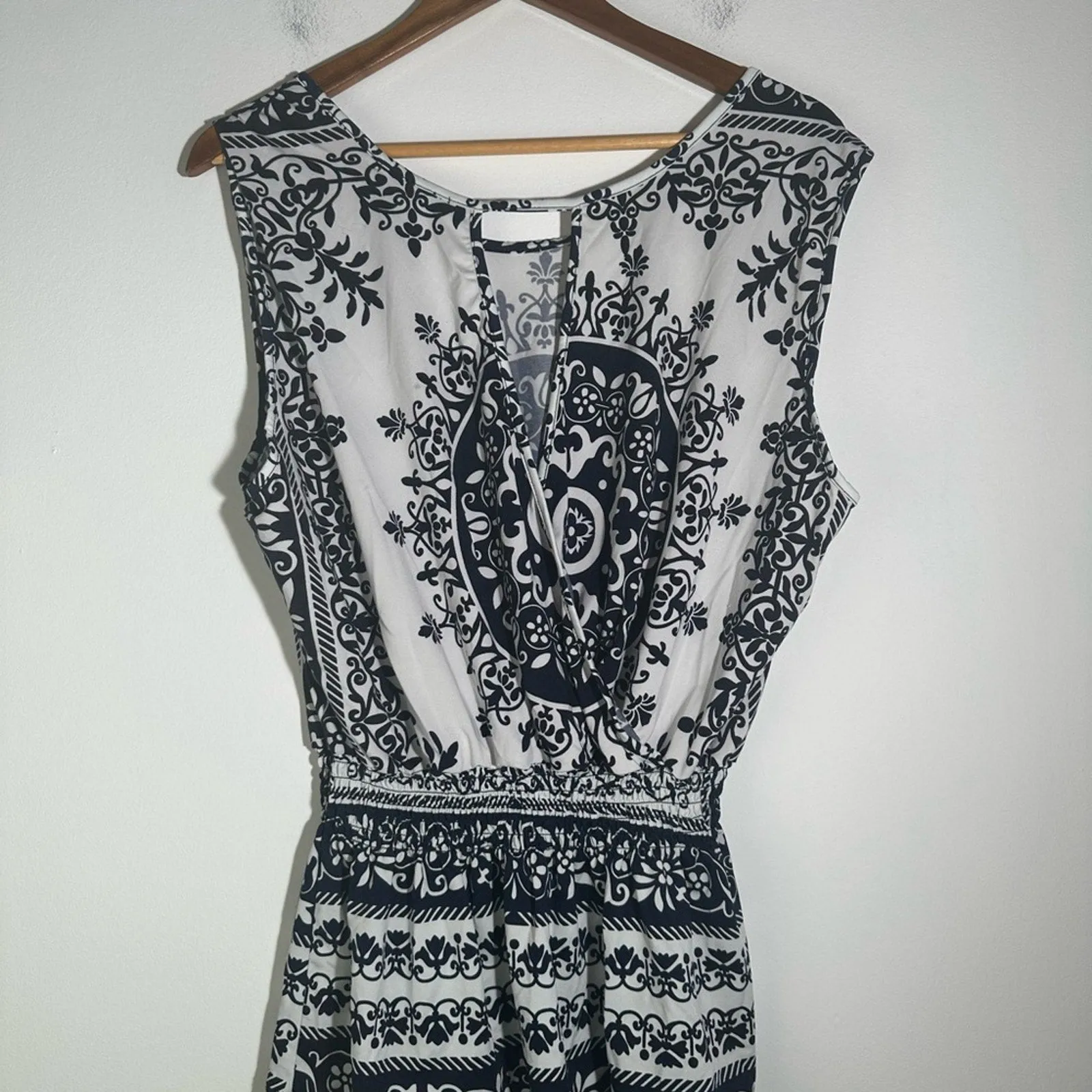 Black and White Peplum Blouse with Intricate Design