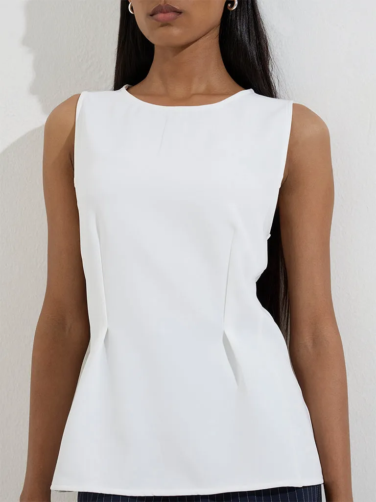 Wardrobe Ivory Solid Peplum Top